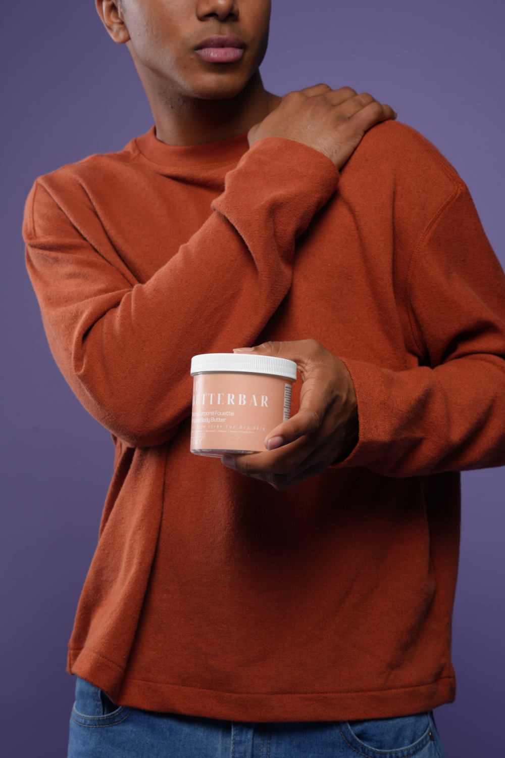Whipped Shea butter body butter for dry skin, with model.